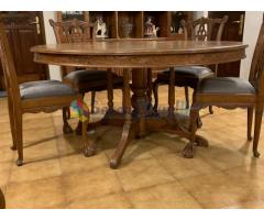 Teak round dining table with 8 teak chairs