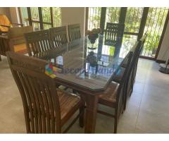 Wooden dining table with glass top (8-seater)