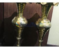Traditional brass oil lamp with vases