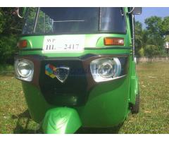 2 stroke bajaj three wheel