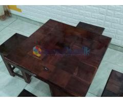 Teak gloss table with four benches